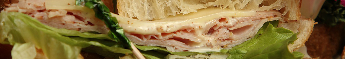 Eating Gluten-Free Sandwich Bakery at Waialua Bakery & Juice Bar restaurant in Haleiwa, HI.